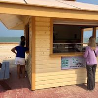 on the ocean side of BTL park at Vegan Bites in Belize City