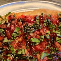 Bruschette vegan pizza at Papa Luigi in Elmer