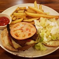 Steakhouse burger with beyond meat steak at Veggie Grill by Next Level in Carlsbad