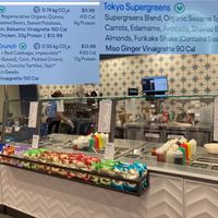 Counter, plus some vegan items on wall menu highlighted at Just Salad - Hunter College in New York City