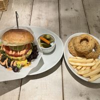 Cheeseburger comes with pickles and fries. I added onion rings to my order!  at AIN SOPH.Soar in Tokyo