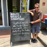 look for the big sign at Roots Wraps and Smoothies in San Ignacio