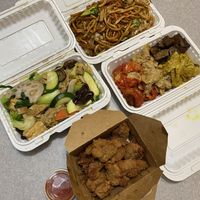 Left to right, top to bottom: vegetarian meat and fried Shanghai noodles, veggie house chow mein, assorted wheat gluten, garlic dried ribs   at Happy Veggie House in Calgary