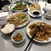 Vegan ginger beef, Shanghai noodles, dumplings, and vegan beef and broccoli  at Happy Veggie House in Calgary
