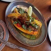 Grilled corn with peppers. They use butter so it is not vegan. at CHUI in Mexico City