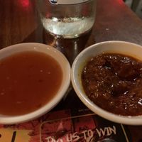 Extra sauces: sweet chili (L) and homemade chili paste (R)  at Banana Tree - Wardour in London