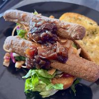 Vegan sausage & bacon sandwich  at The Bach on Surf Highway in Oakura