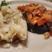 Bruschetta Portabella Cap & dry baked potato at White Rhino Bar & Grill  in Dyer