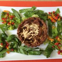 Vegan sausage and onion quiche  at Eden in Eden in Miami