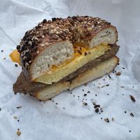 Vegan sausage egg and cheese on an everything bagel  at Spielman Bagels - Division in Portland