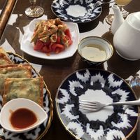 Eggplant salad, spinach bichak, and lemon tea!  at Chinar in Bukhara