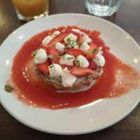 Strawberry tart with whipped cream at Mauvaise Herbe in Marseille