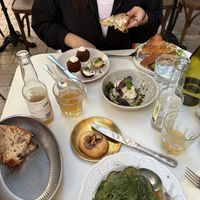 Potato croquettes, tofu and veggie croissant, vegan mozzarella with pesto, cucumber salad, and a hazelnut cookiee  at Mauvaise Herbe in Marseille
