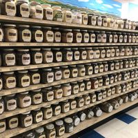 Shelves of herbs at Village Health Foods in Modesto