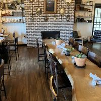  at Curiouser Coffee and Conservatory in Apple Valley
