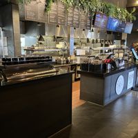 Ordering counter at Curiouser Coffee and Conservatory in Apple Valley