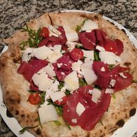 Pizza Parma at Swami's Garden in Praia Da Luz