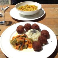 curry noodles and falafel with rice and vegetables at O Elefante in Santiago De Compostela