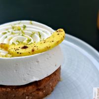 

Crunchy Breton shortbread base with chocolate, salted caramel, banana flambéed with rum, Madame coconut cream at Les Artizans - Coffee And Flower in Paris