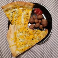 Ignore the air-fried potatoes lol. This is the cheesy potato pizza. at Ian's Pizza in Milwaukee