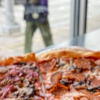 Right across from Whole Foods 😁  at Ian's Pizza in Milwaukee