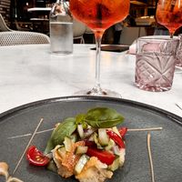 Small bites with cucumber, tomato and breadd  at Italia Lane in Fortitude Valley