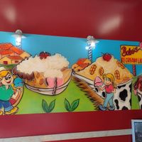 Happy mural inside at Babes Ice Cream in Milwaukee