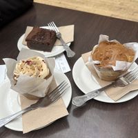 Vegan cherry brownie, vegan banana, chocolate, and Biscoff muffin, vegan coffee & walnut muffin.   at Bruschetta by Food Cabaret in Leeds