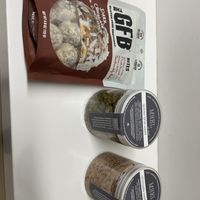 GFB Bites (not delicious) were $8.99 and the lentils (pretty good taste) and overnight oats (pretty good) were $14 each.   at BNA - MEEL - Gate C14 in Nashville