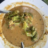 Broccoli in peanut sauce—we ate most of this before the picture! 😂  at Pingala Cafe in Burlington