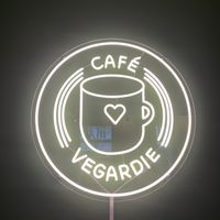 The sign is on the wall  at Café Vegardie in Berlin