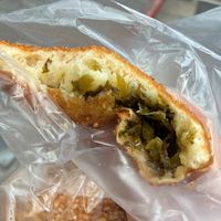 Inside of a pickled mustard green bun (酸菜包) at Twins Donuts - 雙胞胎甜甜圈 in Taipei