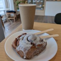 Cinnamon bun and latte! at Gleam & Sip  in Toronto