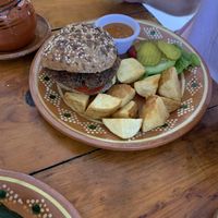 Vegan burger, pickles on the side  at Vegetariano Mar y Tierra in Tulum