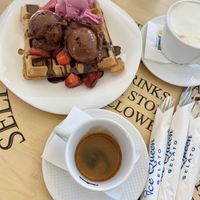 Vegan waffle with vegan chocolate and vegan pomegranate ice cream. Unbelievable flavors! Soy latte on the side    at Ice Queen Gelato in Athens