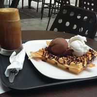 Vegan waffle with vegan chocolate and coconut gelato and a soya frappe. YUM! at Ice Queen Gelato in Athens