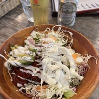 Loco bowl with burger inside and rice at the bottom   at Paprika Shokudo Vegan in Osaka