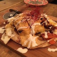 Soy meat yaki niku pizza with thin crust and soy cheese  at Paprika Shokudo Vegan in Osaka