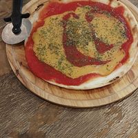 The tomato pizza with soy cheese at Paprika Shokudo Vegan in Osaka