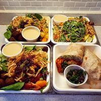 Takeout from Fresh...Ultimate falafel salads, Phytosalad, and Buffalo chick'n wrap. at Fresh on Eglinton in Toronto