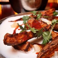 Sweet potato coconut masala
Roasted sweet potatoes with garam masala, coconut-lemongrass sauce, smoked paprika oil, and cilantro. at Maslow - Temple in Paris
