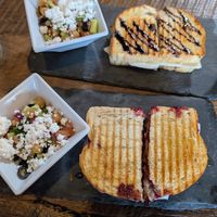 Signature and Honee and berry jam-brie vegan paninis, comes with side salad at Let it Brie in Fullerton