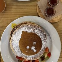 Oat pancakes with fruit and maple syrup   at Billy Brunch & Terrace in Sevilla