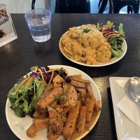 Cauliflower w/ vegan cheese and sweetpotatoe fries  at Afterglow by ANGLOW in Central Singapore