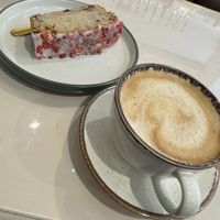 Oat latte with vegan summer fruit cake  at Richmonds in Newport