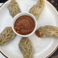 Vegan momos  at The Funky Buddha Bar & Restaurant in Denver