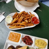 Falafel Teller, Falafel mit Aubergine sowie Pommes  at Vegi in Tubingen