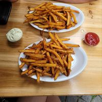 2x homemade fries with 1 serving of mayo and 1 serving of ketchup at Vegi in Tubingen