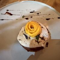 Carrot cake. Moist and topped with mango.  at Cósmica Cocina  in Puerto Vallarta