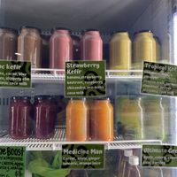 Awesome smoothie and juice options good to go  at New Earth Cafe in Coolum Beach